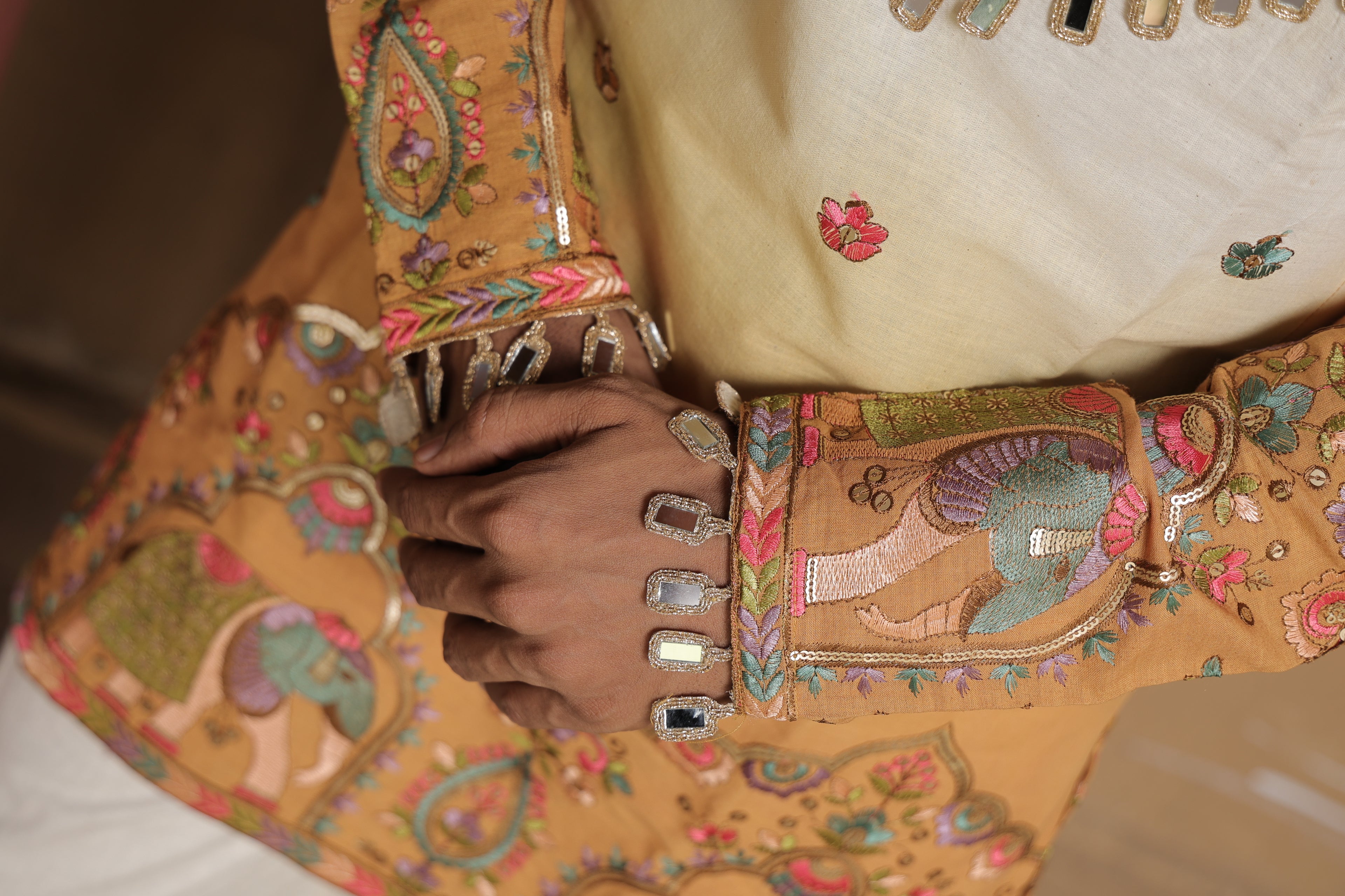 Men's Cream & Mustard Embroidered Mirror Work Kurta with Elephant Motif Thigh-Length Kurta