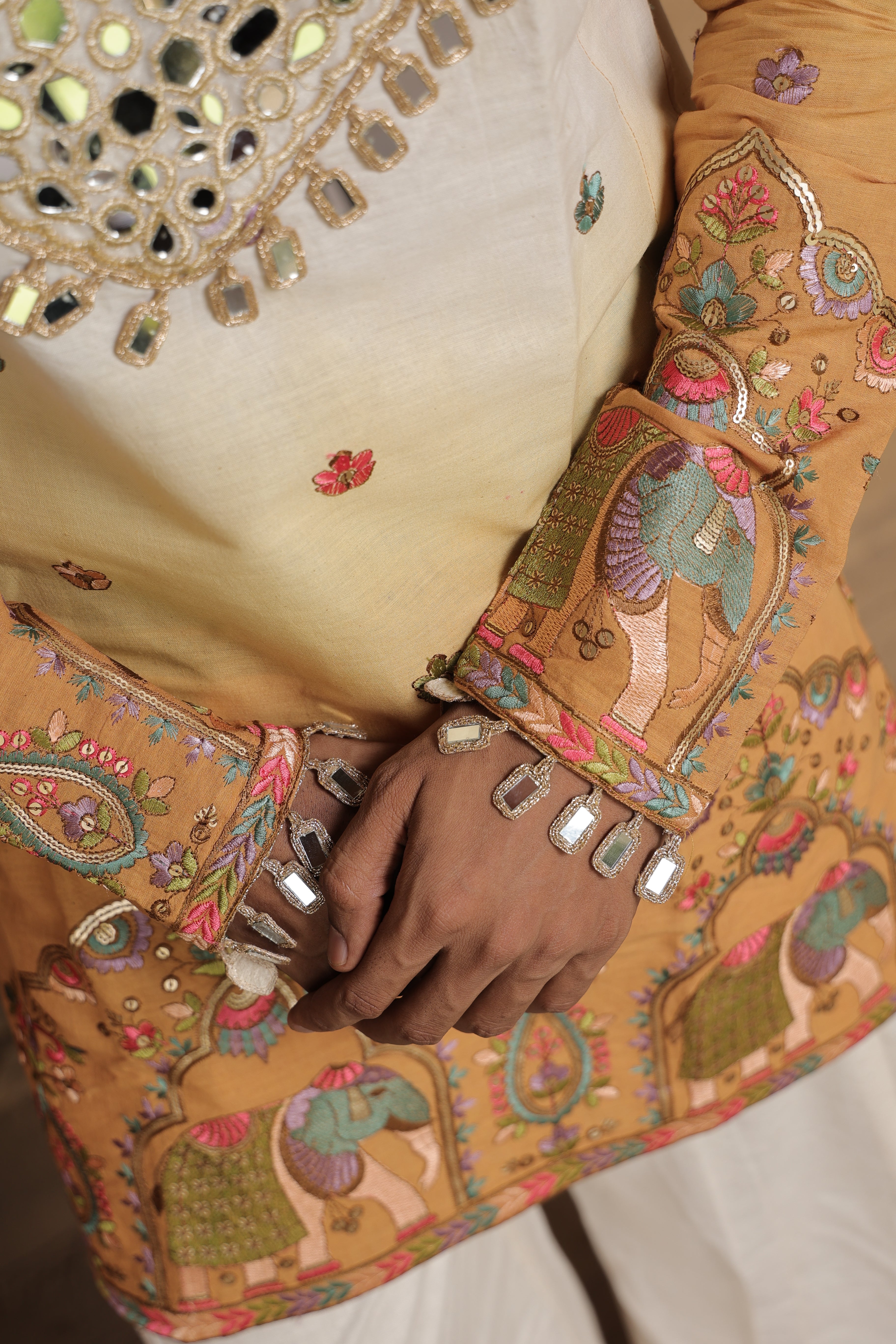 Men's Cream & Mustard Embroidered Mirror Work Kurta with Elephant Motif Thigh-Length Kurta